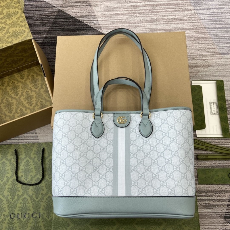 G*u*i shopping bags